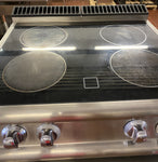 Cucina elettrica in vetroceramica da appoggio usata Baron a 4 zone di cottura