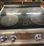 Cucina elettrica in vetroceramica da appoggio usata Baron a 4 zone di cottura